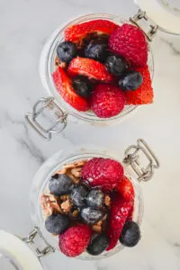 overhead view of two Make-Ahead Berry Yogurt Parfaits